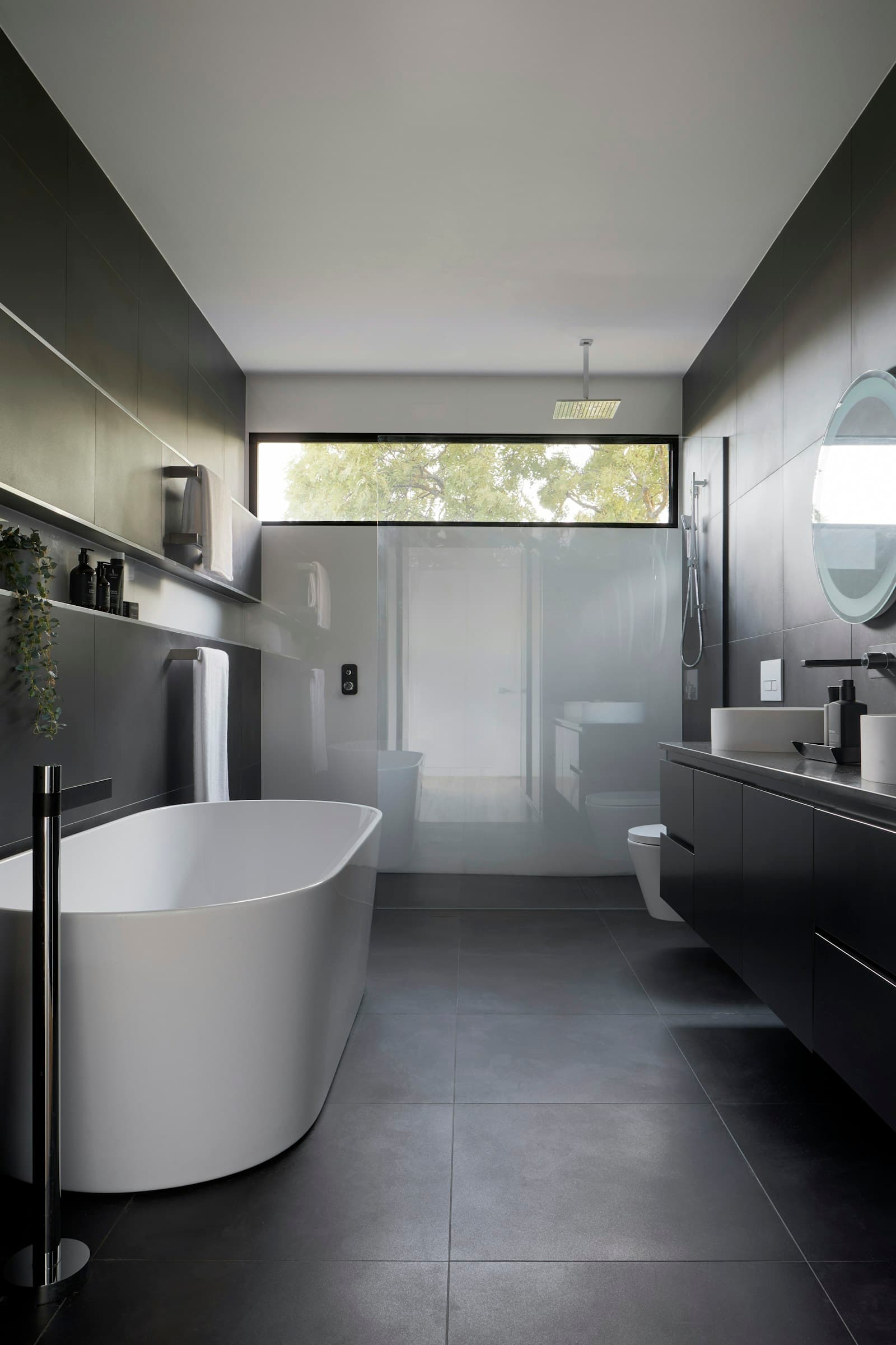 Modern bathroom remodel with vanity and walk-in shower